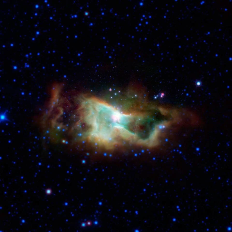 Infrared view of the Iris Nebula, NGC 7023, surrounded by stars